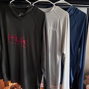 Huk Performance Fishing Shirts in Black, White, and Blue